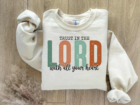 a white shirt that says trust in the lord with all your heart
