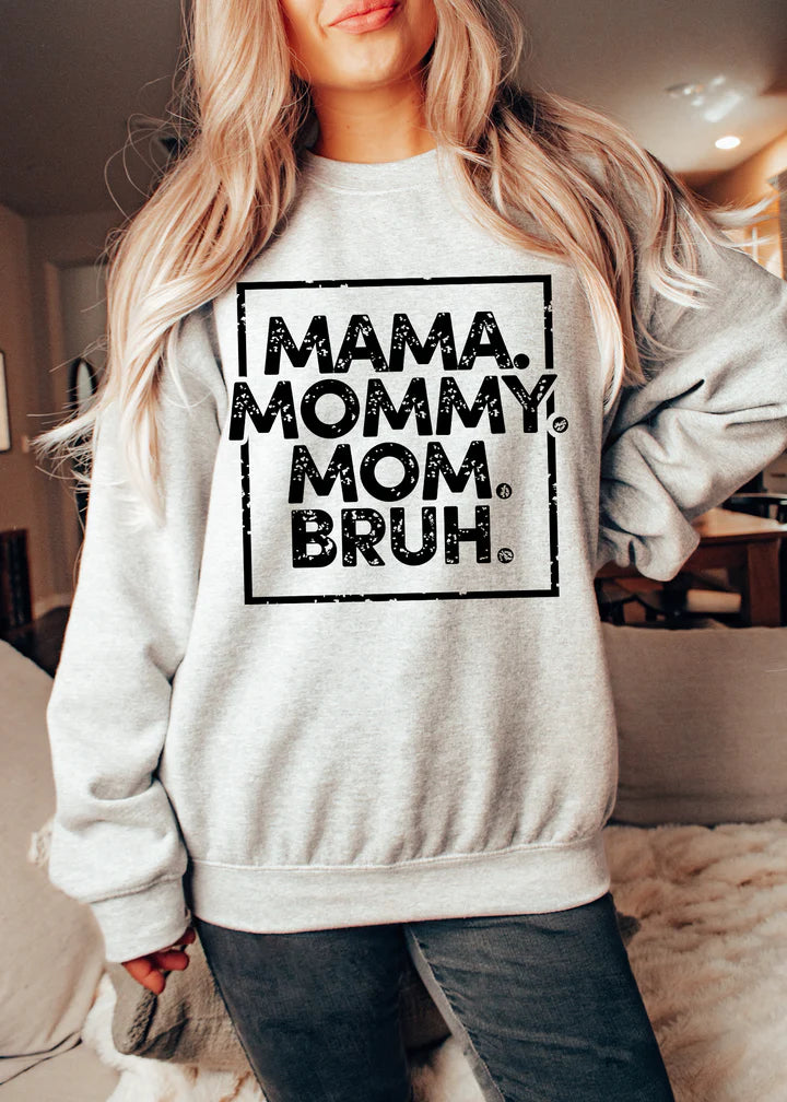 a woman wearing a sweatshirt that says mama, mommy, mom, bruh