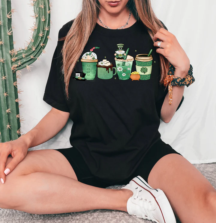 a woman sitting on the floor wearing a black shirt