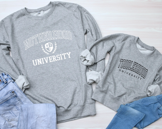 Motherhood Toddlerhood University  Heavy Cotton Sweatshirts