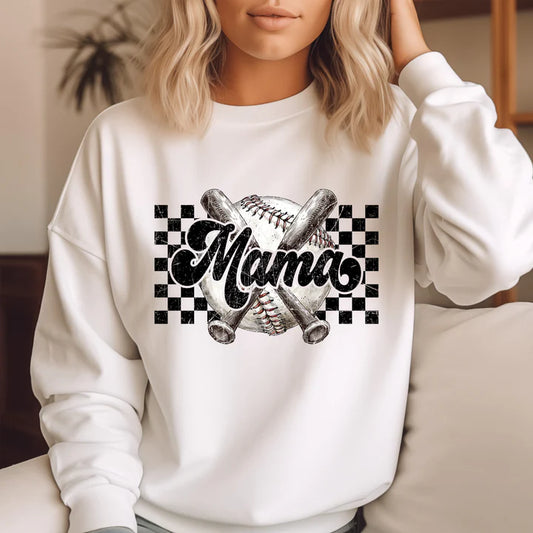 a woman sitting on a couch wearing a white sweatshirt