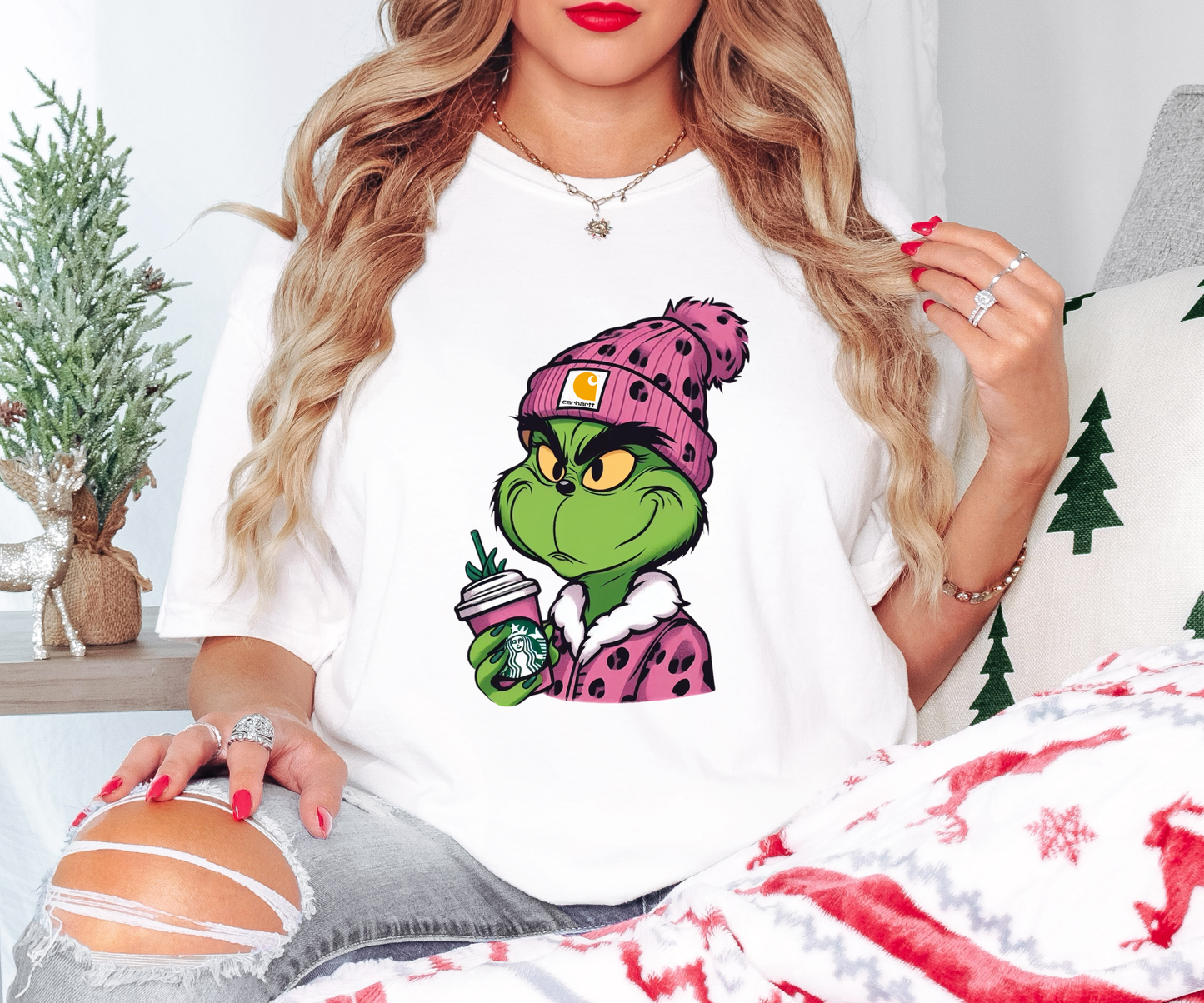 a woman wearing a white shirt with a cartoon character on it